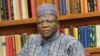 Jigawa State Governor Sule Lamido (R) waits on set for interview to begin.