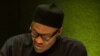 Shugaba Muhammadu Buhari, Shugaban Tarayyar Afirka Mai ci, a lokacin da ya ke jawabi a zauren taron