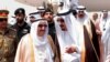 FILE - King Salman of Saudi Arabia (R) welcomes Kuwaiti Emir Sabah Al Ahmed Al Sabah upon his arrival to Riyadh Airbase before the opening of Gulf Cooperation Council summit in Riyadh, Saudi Arabia, May 2015.
