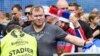 Spectators are searched by a steward as they enter the stadium for the Euro 2016 Group B soccer match between Russia and Slovakia at the Pierre Mauroy stadium in Villeneuve d’Ascq, near Lille, France, June 15, 2016. 