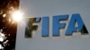 FILE - The logo of FIFA is pictured in front of its headquarters in Zurich, Switzerland.