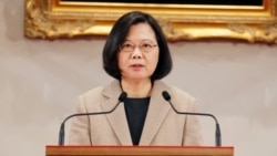 VOA Asia - Taiwan and China trade conflicting messages