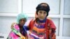 Saida Ahmad Baghili, 18, sits next to her relative at the al-Thawra hospital where she receives treatment for severe acute malnutrition in the Red Sea port city of Houdieda, Yemen, Oct. 25, 2016. 