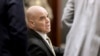 Robert Telles, a former Clark County public administrator charged in the murder of Las Vegas Review-Journal investigative journalist Jeff German, talks to his attorneys in Las Vegas, Aug. 19, 2024. 
