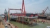 Upacara peluncuran kapal induk ketiga China "Fujian" di dermaga Shanghai, 17 Juni 2022. (Li Gang/Xinhua via AP)