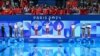 Left to right, silver medallist Chen Yuxi of China, gold medallist Quan Hongchan of China and bronze medallist Kim Mi Rae of North Korea stand on the podium after the women's 10-meter platform diving final during the Olympic Games in Saint-Denis, France, on Aug. 6, 2024.