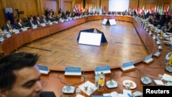 Berlin'de düzenlenen Suriyeli mültecilere yardım konferansı