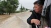 This picture taken on July 28, 2024 and released from North Korea's official Korean Central News Agency (KCNA) via KNS on July 29, 2024 shows North Korea's leader Kim Jong Un inspecting flood damage in Sinuiju, North Pyongan province.
