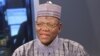 Jigawa State Governor Sule Lamido (R) waits on set for interview to begin.