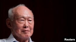 FILE - Former Singapore Prime Minister Lee Kuan Yew (LKY) smiles as he attends the LKY School of Public Policy 7th anniversary dialogue session in Singapore September 14, 2011. 