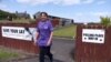 A woman leaves after casting her vote in the EU referendum, at Maidens Bowling Club, which is being used as a polling station, in South Ayrshire, Scotland, Britain, June 23, 2016. 