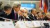 U.S. Secretary of State John Kerry (2nd L) delivers remarks to the OSCE Ministerial Council meeting in Belgrade, Serbia, Dec. 3, 2015.
