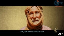 This 2017 image from a video provided by the SITE Intelligence Group shows Australian surgeon Kenneth Elliott, who was being held hostage by al-Qaida's Mali branch. He and his wife were seized in January 2016 from Djibo, near Burkina Faso's border with Mali.