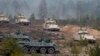  Soldiers from different NATO countries attend a military exercise 'Iron Sword 2014', at the Gaiziunu Training Range in Pabrade some 60 km (38 miles) north of the capital Vilnius, Lithuania, Nov. 13, 2014.