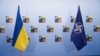 Прапори України та НАТО на полях саміту НАТО у Вільнюсі, 12 липня 2023 року. (Фото Odd ANDERSEN / AFP)