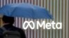 FILE - Meta Platforms' logo is pictured in Davos, Switzerland. 