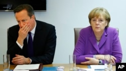 İngiltere Başbakanı David Cameron ve Almanya Başbakanı Angela Merkel