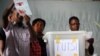 FILE - Pollling officials distinguish votes between Hutus and Tutsis in Burundi's capital, Bujumbura, July 28, 2010. 