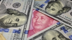VOA Asia - China warns against a trade war