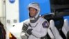 FILE - European Space Agency astronaut Thomas Pesquet of France talks to family and friends before a launch attempt at the Kennedy Space Center in Cape Canaveral, Florida, April 23, 2021.