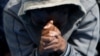 A migrant prays on the Migrant Offshore Aid Station ship Topaz Responder after being rescued around 20 nautical miles off the coast of Libya, June 23, 2016.