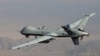 Undated handout photo provided by U.S. Air Force shows MQ-9 Reaper, armed with GBU-12 Paveway II laser guided munitions and AGM-114 Hellfire missiles