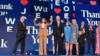 President Joe Biden holds Vice President and 2024 Democratic presidential candidate Kamala Harris' hand after delivering the keynote address, as the Biden family stands alongside, on the first day of the Democratic National Convention in Chicago, Aug. 19, 2024. 