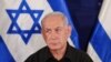 Perdana Menteri Israel Benjamin Netanyahu saat konferensi pers di pangkalan militer Kirya di Tel Aviv, Israel, 28 Oktober 2023. (Foto: via AP)