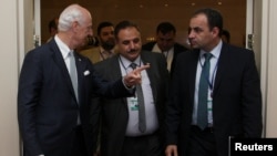 FILE - U.N. special envoy for Syria Staffan de Mistura and Ahmed Beri, chief of staff of the Free Syrian Army, attend the round on Syria peace talks in Astana, Kazakhstan, July 5, 2017.