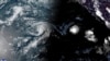 This satellite image provided by the National Oceanic and Atmospheric Administration shows Tropical Storm Hone and Hurricane Gilma located southeast of Hawaii on Aug. 22, 2024.