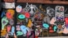 A man walks past a mural in the Harlem neighborhood of New York, Aug. 15, 2024.