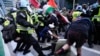 Demonstrators clash with police near the Israeli Consulate during the Democratic National Convention Aug. 20, 2024, in Chicago. 