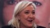 French far-right leader and National Front Party, Marine Le Pen, addresses the media during a news conference, Dec. 7, 2015, in Lille. France's far-right National Front ran strongly in a first-round regional vote that was the first election since an attack by Islamic extremists left 130 dead in Paris. 