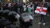 Belarusian opposition supporters hold a rally in Minsk