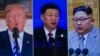 People watch a screen showing images of (L-R) South Korea's president Moon Jae-in, US president Donald Trump, China's president Xi Jinping, and North Korea's leader Kim Jong Un at a railway station in Seoul on May 11, 2018.