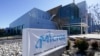 FILE - A sign marks the entrance of the Micron Technology automotive chip manufacturing plant in Manassas, Virginia, Feb. 11, 2022.