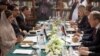 Pakistan's Foreign Minister Hina Rabbani Khar, left, holds talks with her Russian counterpart Sergey Lavrov in Islamabad, Pakistan, October 4, 2012. 