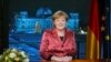 Almanya Başbakanı Angela Merkel Yeni Yıl konuşmasını yaparken 